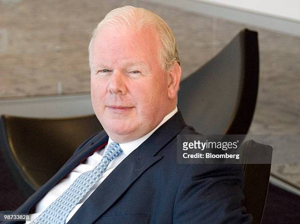 Michael "Mike" Smith, chief executive officer of Australia & New Zealand Banking Group Ltd. , poses for a photograph during an interview in Sydney,...