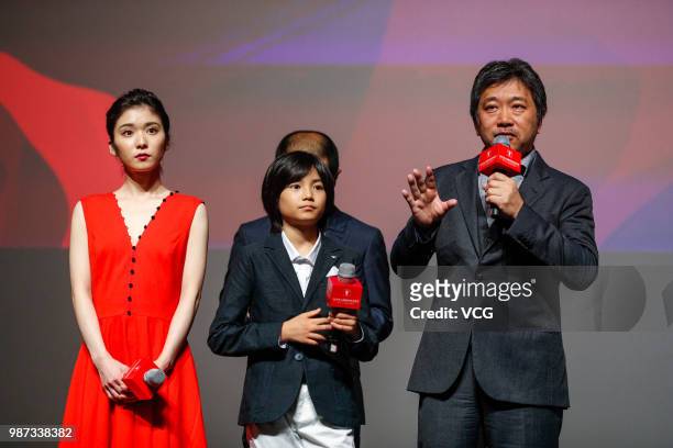 Japanese actress Mayu Matsuoka, Japanese actor Kairi Jo and Japanese director Hirokazu Kore-eda attend a meeting of film 'Shoplifters' during the...