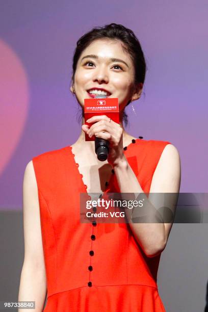 Japanese actress Mayu Matsuoka attends a meeting of film 'Shoplifters' during the 21st Shanghai International Film Festival at Shanghai Film Art...