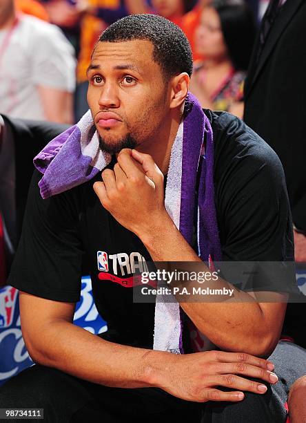 Brandon Roy of the Portland Trail Blazers sits on the bench while taking on the Phoenix Suns during Game Five of the Western Conference Quarterfinals...