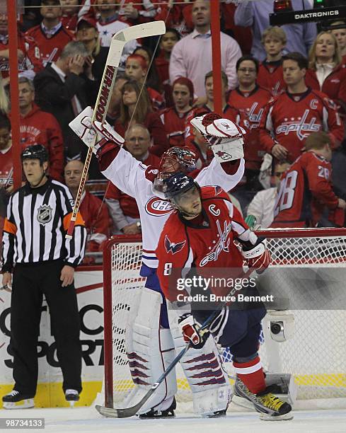 Jaroslav Halak of the Montreal Canadiens celebrates as Alex Ovechkin of the Washington Capitals skates away following the Canadiens 2-1 win in Game...