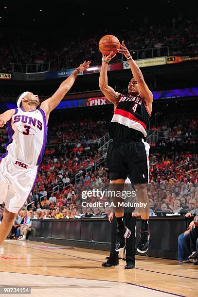 Jerryd Bayless of the Portland Trail Blazers shoots over Jared Dudley of the Phoenix Suns during Game Five of the Western Conference Quarterfinals of...