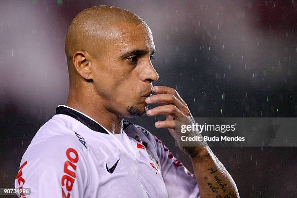 Roberto Carlos of Corinthians reacts during a match against Flamengo as part of the Libertadores Cup at Maracana Stadium on April 28, 2010 in Rio de...