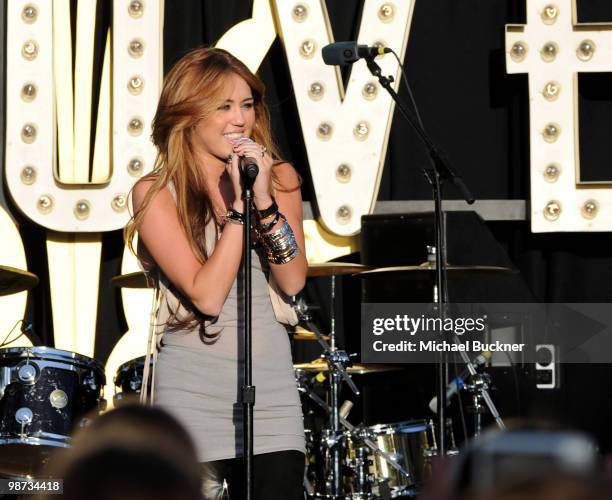 Singer Miley Cyrus performs at the Make-A-Wish Foundation's "World Wish Day" at The Grove on April 28, 2010 in Los Angeles, California.