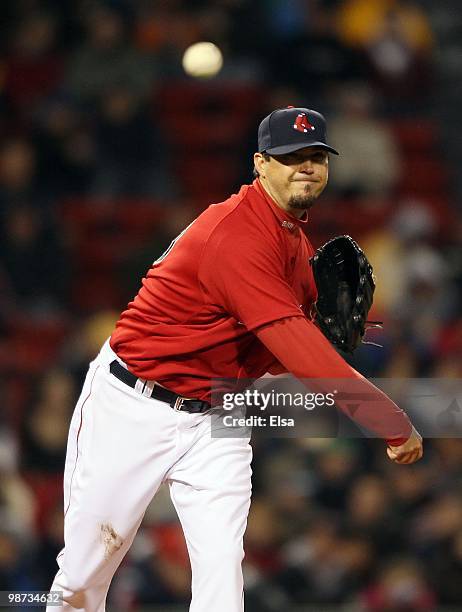 Josh Beckett of the Boston Red Sox sends the ball to first for the out against the Tampa Bay Rays on April 16, 2010 at Fenway Park in Boston,...