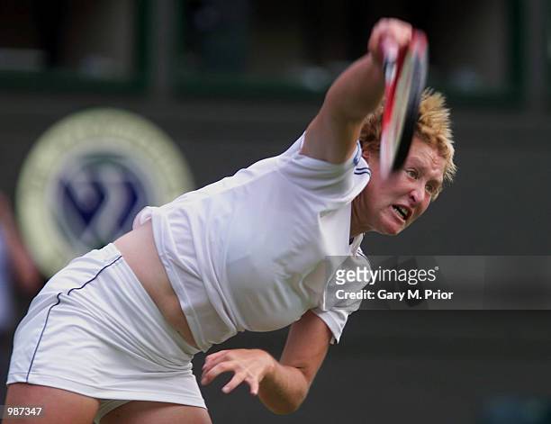 Elena Baltacha of Great Britain in action against Nathalie Dechy of France during the women's first round of The All England Lawn Tennis Championship...