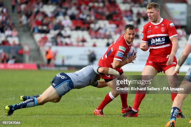 Hull KR's Danny McGuire is tackled by Huddersfield Giants Ryan Hinchcliffe during the Betfred Super League match at Craven Park, Hull.
