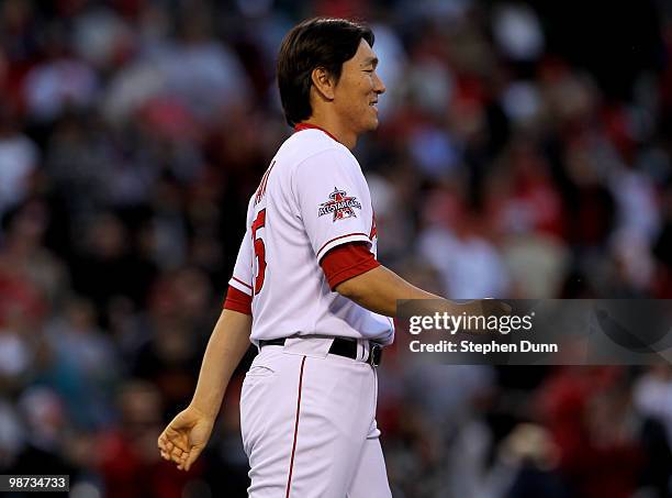 Hideki Matsui of the Los Angeles Angels of Anaheim smiles as his team celebrates their ninth inning victory over the Cleveland Indians on April 28,...