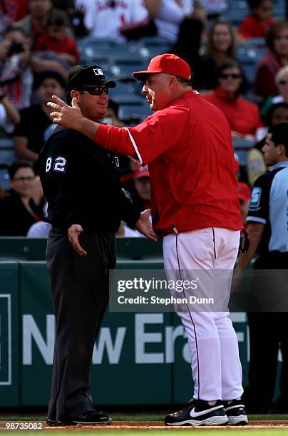 Manager Mike Scioscia of the Los Angeles Angels of Anaheim argues with third base umpire Rob Drake after Drake ejected him in the game with the...