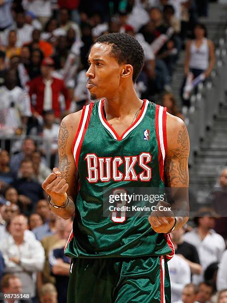 Brandon Jennings of the Milwaukee Bucks reacts after a basket against the Atlanta Hawks during Game Five of the Eastern Conference Quarterfinals of...