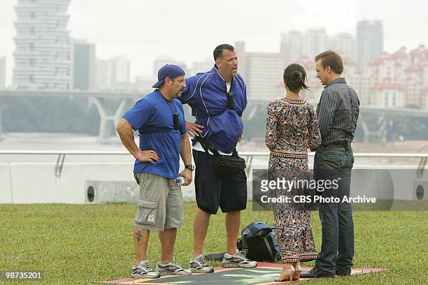 Dumb Did Us In" -- Friends Louis and Michael meet host Phil Keoghan at the Pit Stop at Marina Barrage in Singapore in the hopes of not being...