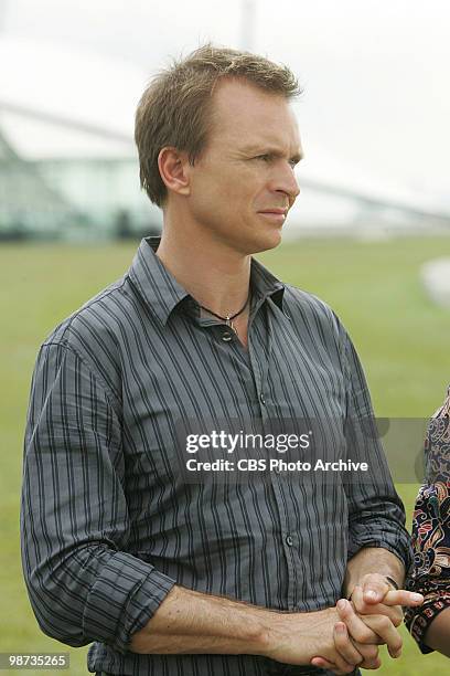 Dumb Did Us In" -- Host Phil Keoghan waits at the Pit Stop at Marina Barrage in Singapore, on THE AMAZING RACE 16 Sunday, April 11 on the CBS...