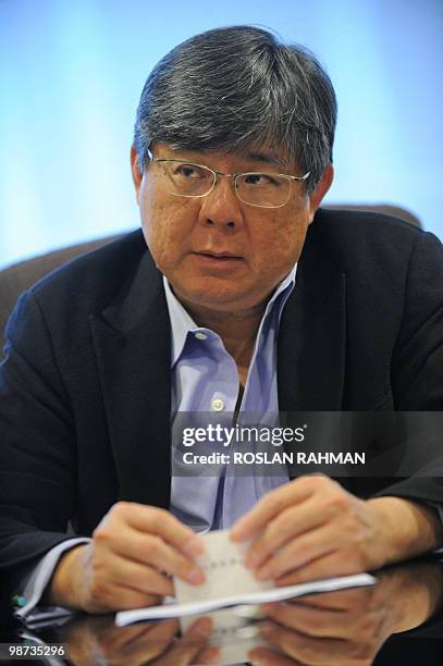 To go with feature story Singapore-Asia-health-medicine-liver by Martin Abbugao This photo taken January 26, 2010 shows Dr Tan Kai Chah, one of...