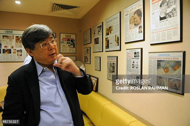To go with feature story Singapore-Asia-health-medicine-liver by Martin Abbugao This photo taken January 26, 2010 shows Dr Tan Kai Chah, one of...