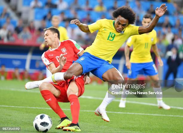 Nemanja Matic of Serbia and Willian of Brazil compete for the ball during the 2018 FIFA World Cup Russia group E match between Serbia and Brazil at...