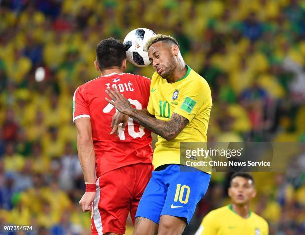 Dusan Tadic of Serbia and Neymar of Brazil compete for the ball during the 2018 FIFA World Cup Russia group E match between Serbia and Brazil at...