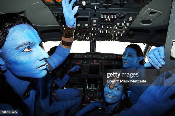 Models dressed up as characters from the film 'Avatar' pose in the cock pit during the launch of "AVATAR" Blu-ray and DVD at Sydney Domestic Airport...
