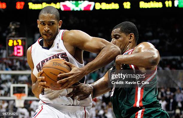 Al Horford of the Atlanta Hawks drives against Kurt Thomas of the Milwaukee Bucks during Game Five of the Eastern Conference Quarterfinals of the...