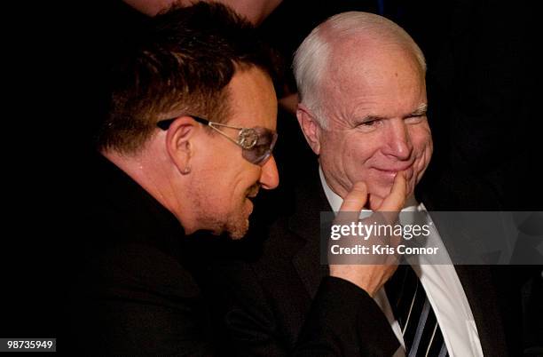 Frontman Bono and U.S. Sen. John McCain talk during the 2010 Atlantic Council awards dinner at the Ritz Carlton Hotel on April 28, 2010 in...