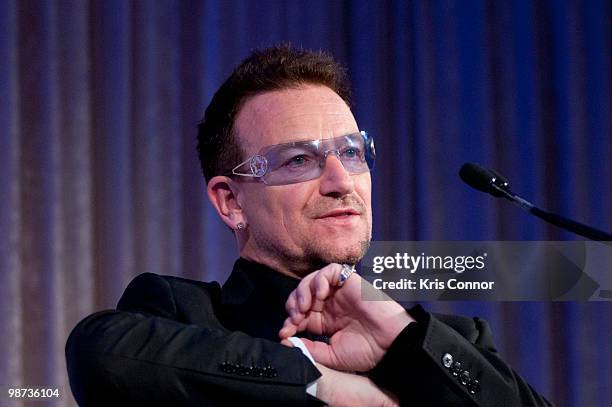 Frontman Bono speaks after being awarded the Distinguished Humanitarian Leadership Award during the 2010 Atlantic Council awards dinner at the Ritz...