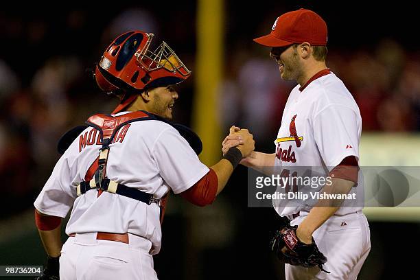 Yadier Molina and Mitchell Boggs of the St. Louis Cardinals celebrate a victory over the Atlanta Braves at Busch Stadium on April 28, 2010 in St....