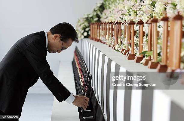 South Korean President Lee Myung-Bak award the medal of honor to deceased sailor of the sunken South Korean naval vessel Cheonan during the funeral...