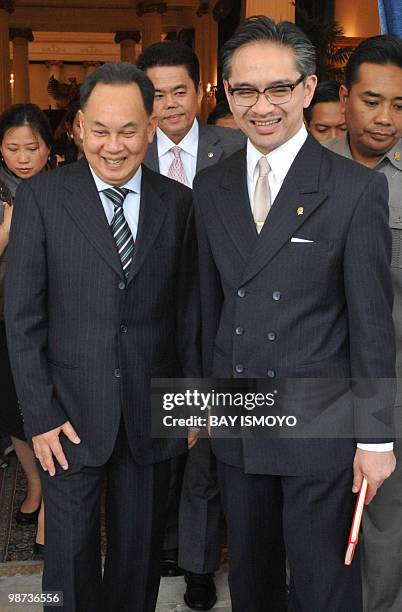 Indonesian Foreign Minister Marty Natalegawa and his Thai counterpart Kasit Piromya leave after a joint press conference at the foreign ministry...