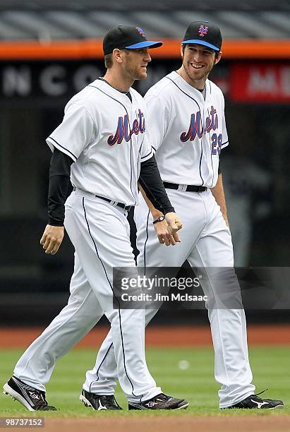 Ike Davis and Jason Bay of the New York Mets warm up before playing the Los Angeles Dodgers on April 28, 2010 at Citi Field in the Flushing...
