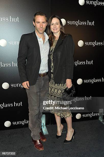 Actor Alessandro Nivola and wife, actress Emily Mortimer attend the opening of the Fifth Avenue Sunglass Hut flagship store at Sunglass Hut on April...