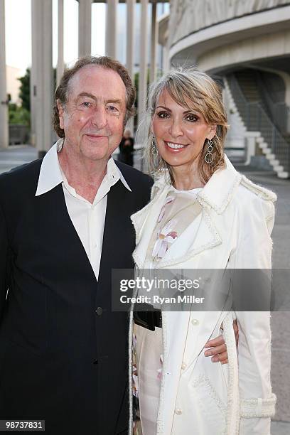 Actors Eric Idle and wife Tania Kosevich pose during the arrivals for the opening night performance of "Alfred Hitchcock's The 39 Steps" at the...
