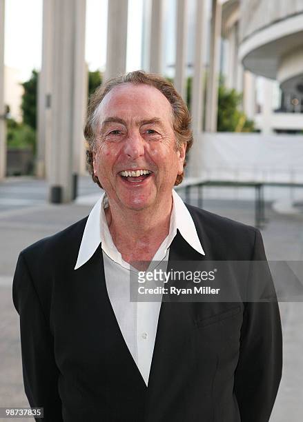 Actor Eric Idle poses during the arrivals for the opening night performance of "Alfred Hitchcock's The 39 Steps" at the Center Theatre Group/Ahmanson...