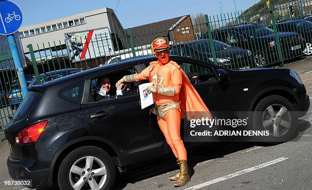 Captain Beany, leader of the New Millennium Bean Party, campaigns in Port Talbot, Wales, on April 16, 2010. Captain Beany, a lurid orange baked bean...