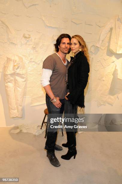 Artist/designer Greg Lauren and actress Elizabeth Berkley attend Greg Lauren Presents Alteration Art on April 28, 2010 in Los Angeles, California.