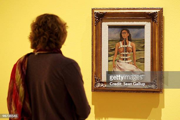 Visitor looks at "The Broken Column" by Mexican painter Frida Kahlo at the Frida Kahlo Retrospective at Martin-Gropius-Bau on April 29, 2010 in...