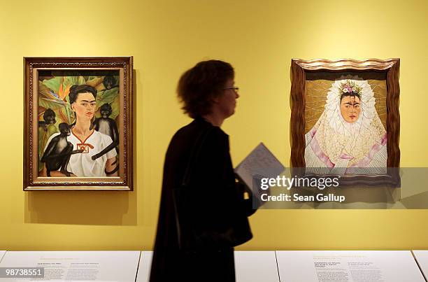 Visitor looks at self-portraits by Mexican painter Frida Kahlo at the Frida Kahlo Retrospective at Martin-Gropius-Bau on April 29, 2010 in Berlin,...