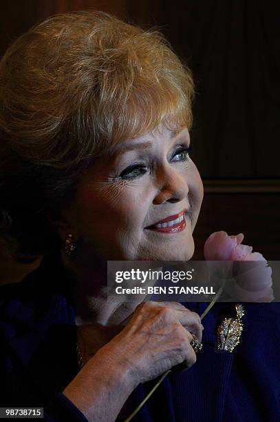 Actress Debbie Reynolds poses for photographs during a press conference in London, on April 1, 2010. MGM legend Debbie Reynolds celebrates more than...