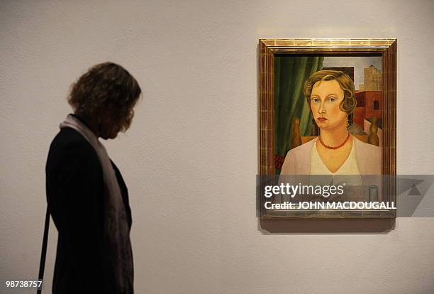 Photographer takes pictures of the painting "Portrait of Mrs. Jean Wight" by Mexican artist Frida Kahlo during a press preview on April 29, 2010 at...