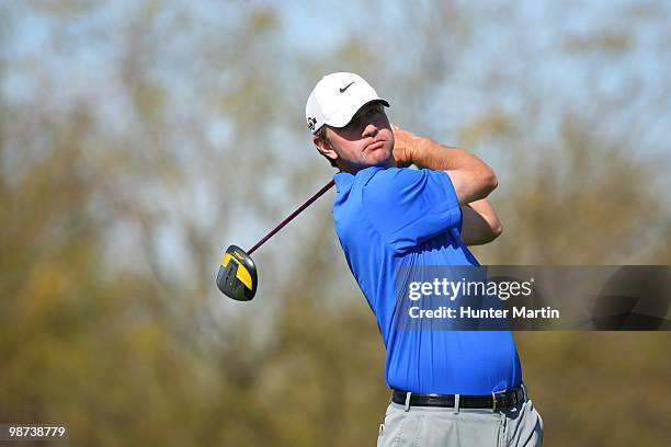 Lucas Glover hits his shot during the second round of the Waste Management Phoenix Open at TPC Scottsdale on February 26, 2010 in Scottsdale, Arizona.