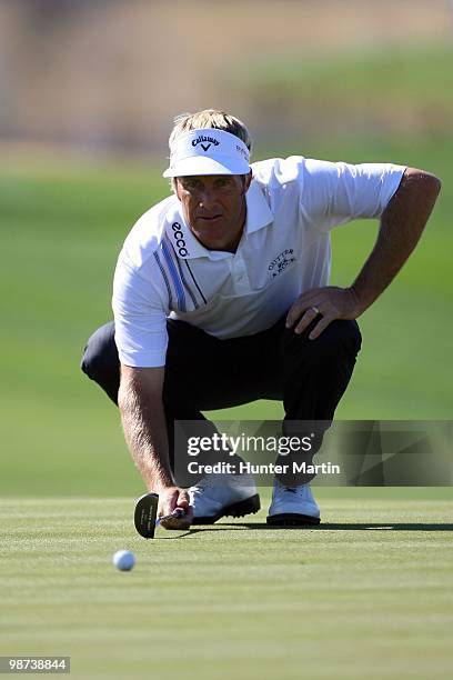 Stuart Appleby lines up a putt during the first round of the Waste Management Phoenix Open at TPC Scottsdale on February 25, 2010 in Scottsdale,...