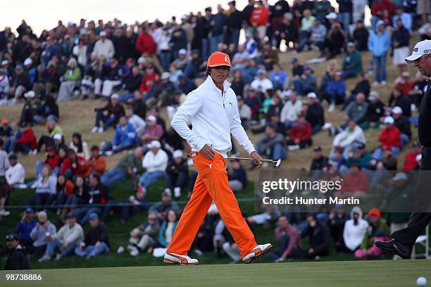 Rickie Fowler walks across a green during the final round of the Waste Management Phoenix Open at TPC Scottsdale on February 28, 2010 in Scottsdale,...