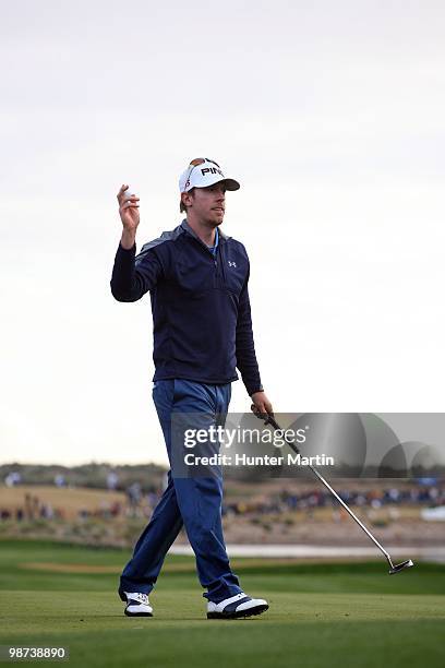 Hunter Mahan waves to fans during the final round of the Waste Management Phoenix Open at TPC Scottsdale on February 28, 2010 in Scottsdale, Arizona.