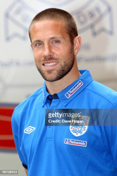 Matthew Upson of England tackles a giant football at Wembley Stadium, the event was to mark the launch of The FA's England Football Day and encourage...