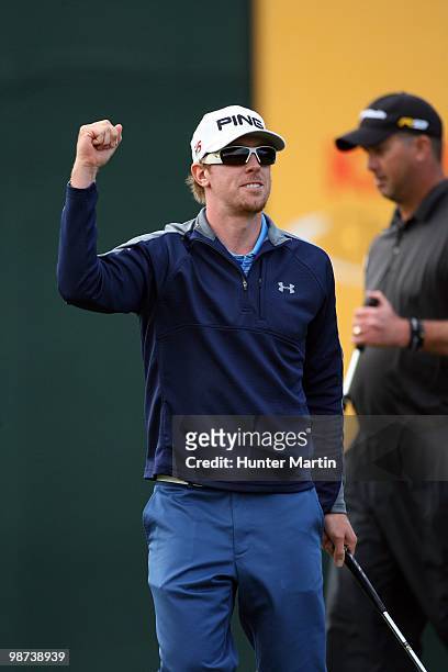Hunter Mahan celebrates after putting during the final round of the Waste Management Phoenix Open at TPC Scottsdale on February 28, 2010 in...