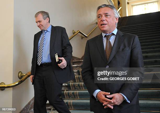 Former prime minister Yves Leterme leaves as chamber president Patrick Dewael talks to the journalists after the Parliament group presidents in the...