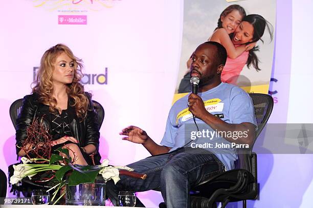 Paulina Rubio and Wyclef Jean attend the press conference for Western Union "Returns The Love" at the Billboard Latin Music Conference & Awards at...