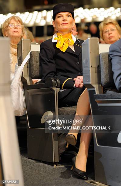 An air hostess of German airline Lufthansa, attends the company's annual general assembly on April 29, 2010 at the International Congress Center in...