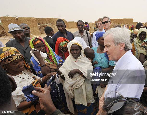 United Nations Under-Secretary-General for Humanitarian Affairs and Emergency Relief Coordinator John Holmes speaks to women in the village of Daly...