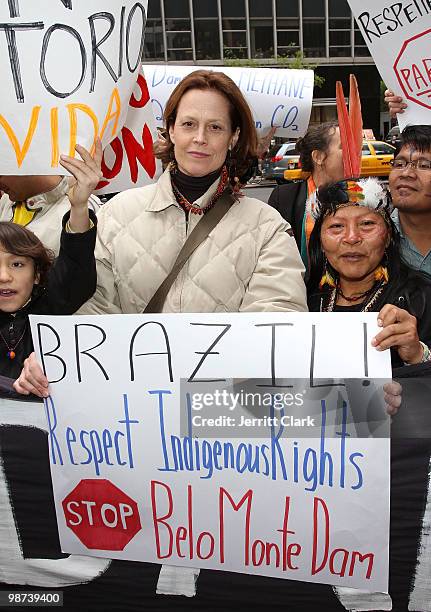 Sigourney Weaver and Manuela Omari Ima Omene of the Huaorani protest the construction of the Belo Monte Dam in Brazil in front of the Brazilian...