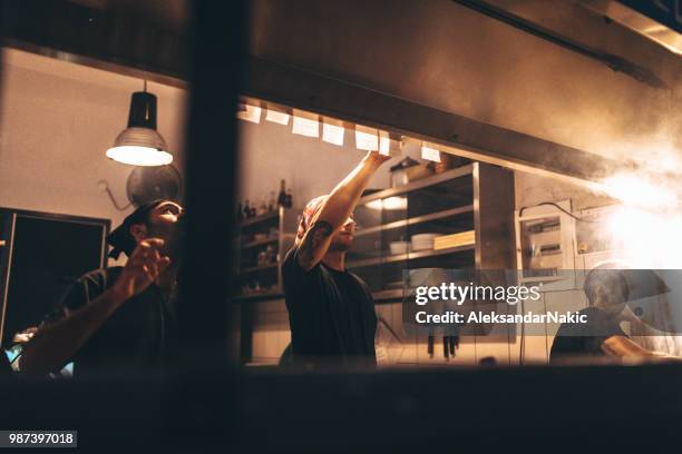 food truck restaurant - crowded kitchen stock pictures, royalty-free photos & images