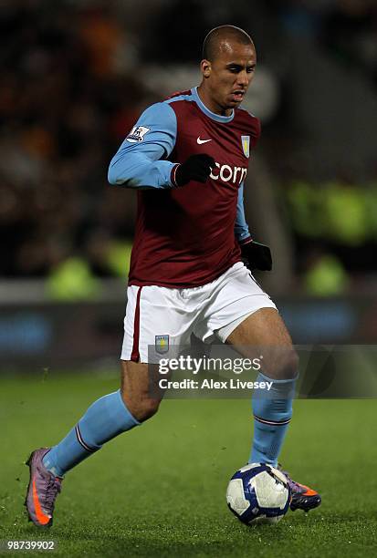 Gabriel Agbonlahor of Aston Villa runs with the ball during the Barclays Premier League match between Hull City and Aston Villa at the KC Stadium on...